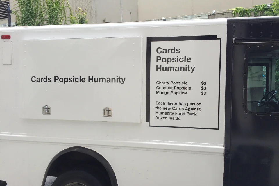 Ice cream truck with menu consisting of Cards Against Humanity ice pops